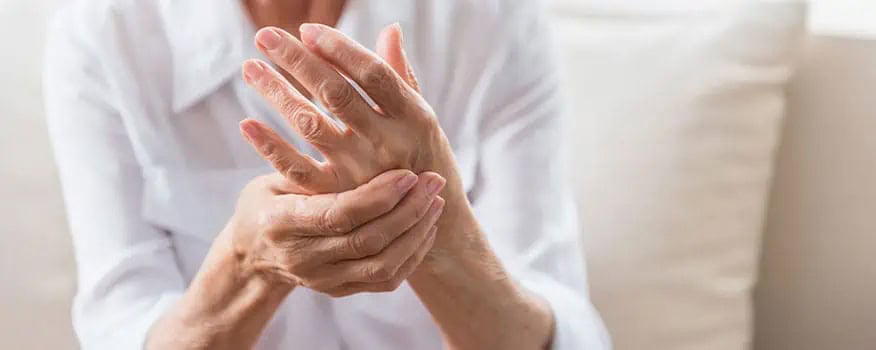 Woman suffering with osteorathritis in redondo beach